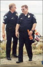 cops taking a break at the beach