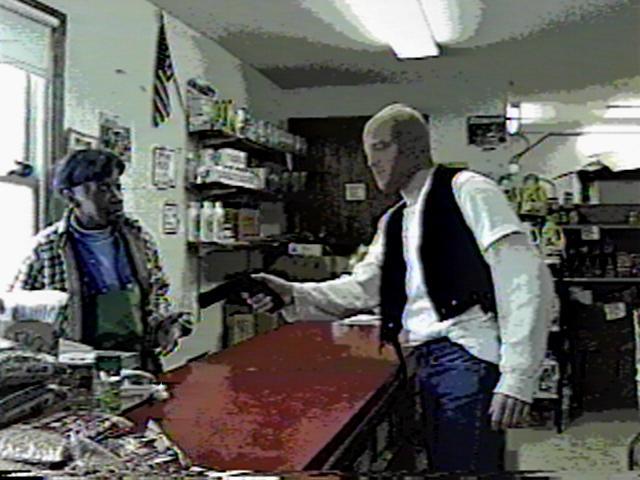 Rusty robbing The Groce Out from the movie   "The Robbery"